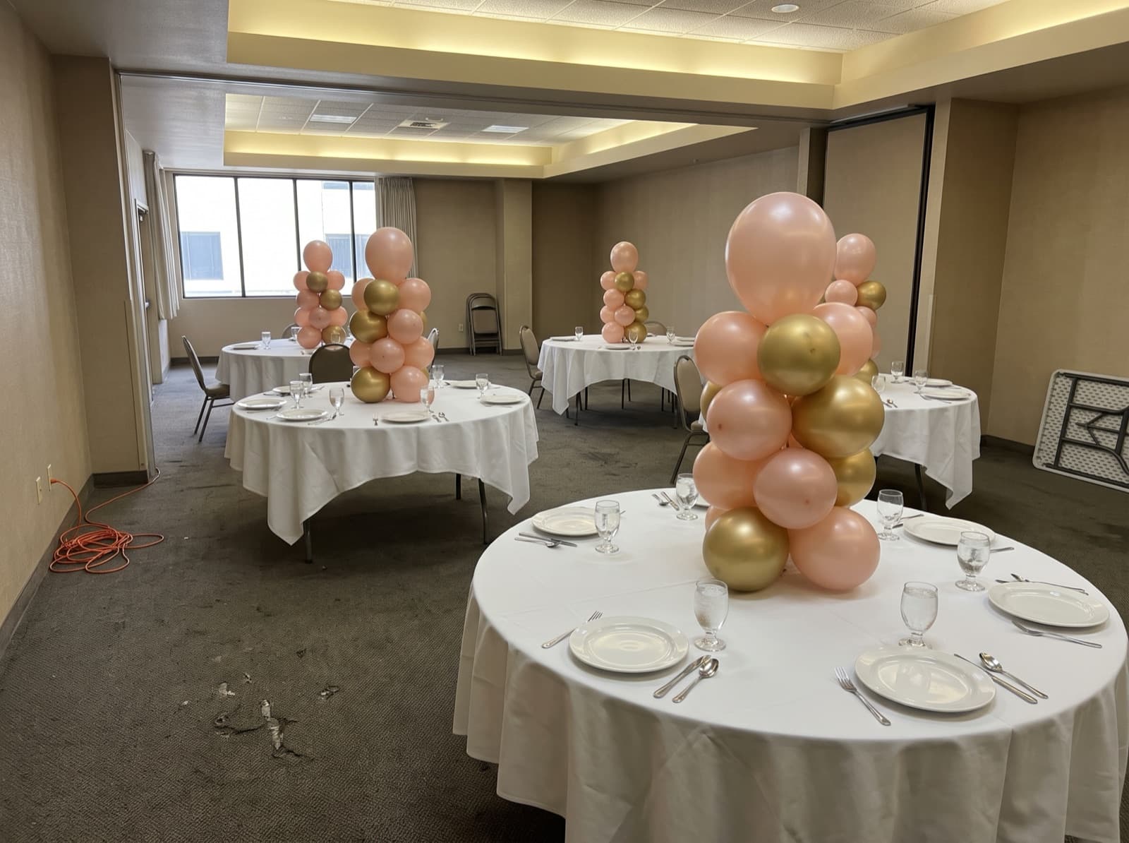 Mini tabletop balloon columns as banquet centerpieces