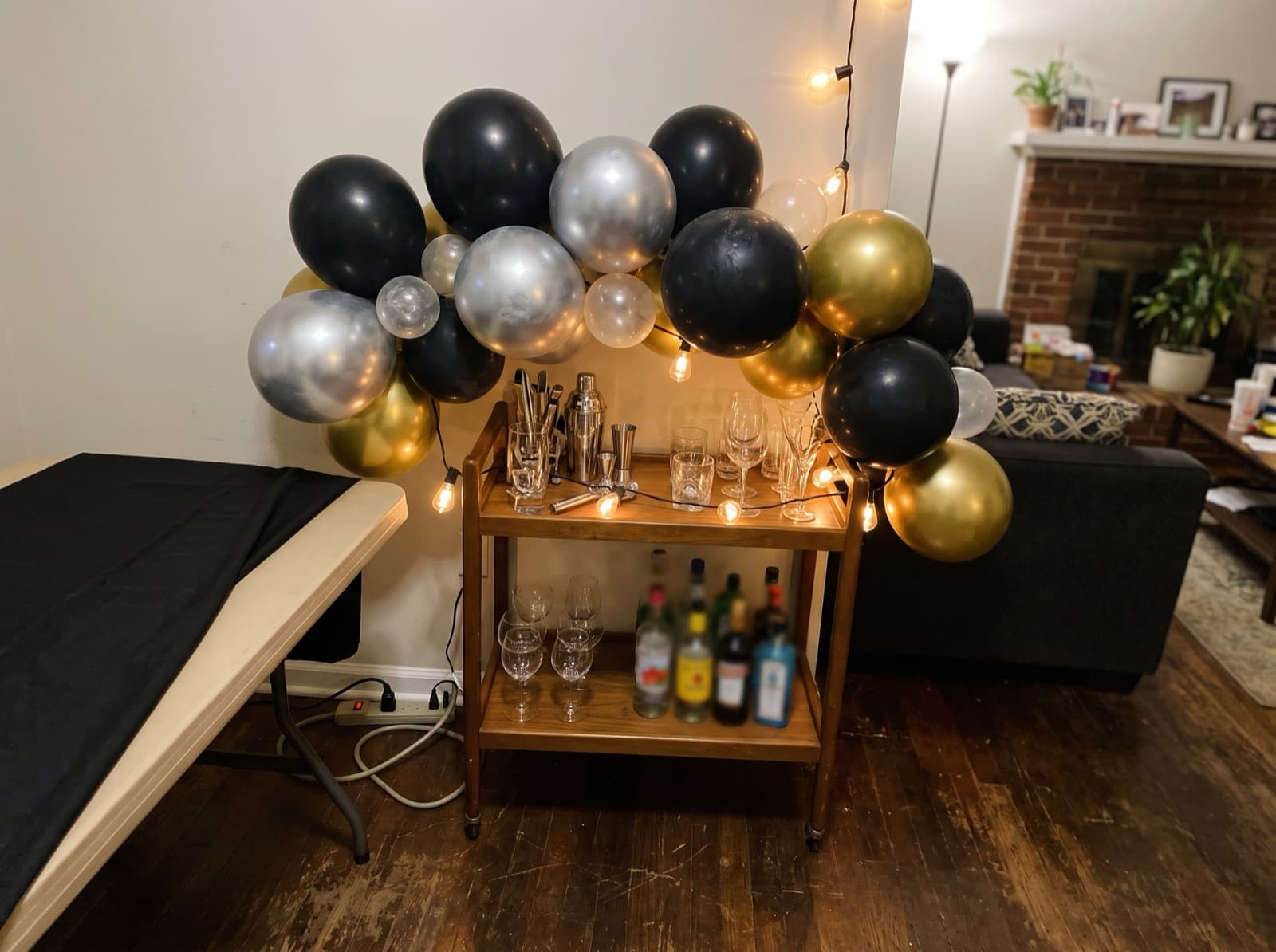 Chrome and black balloon garland for a New Year's Eve party