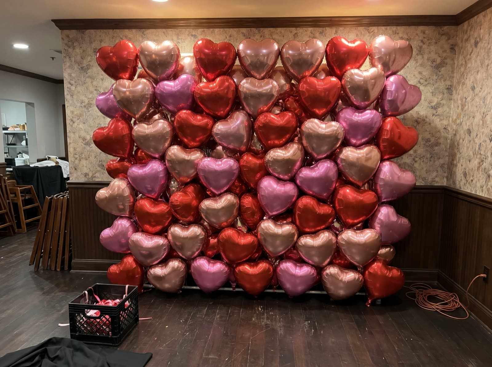 Foil heart balloon wall in red, pink and rose gold