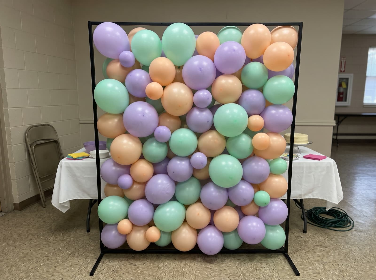 Square framed balloon wall in lilac, mint and peach